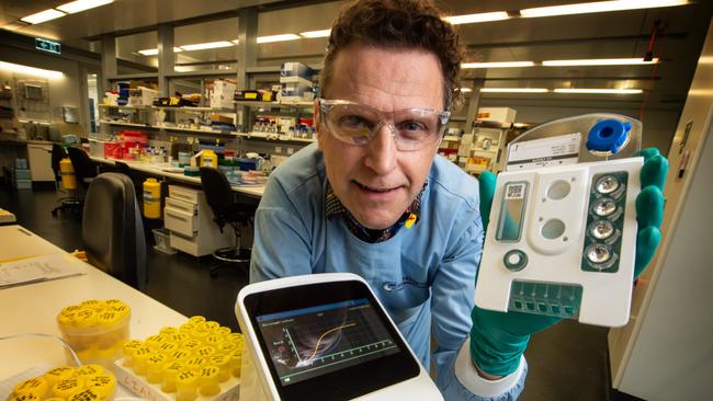 Walter and Eliza Hall Institute scientists are developing a new testing machine that may soon be able to diagnose infectious diseases within a few minutes. Picture: Tony Gough