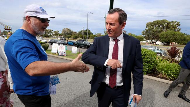 Michael McClure Liberal candidate for Rockingham gives Mark a how to vote for Liberals form. Picture: Colin Murty/The Australian