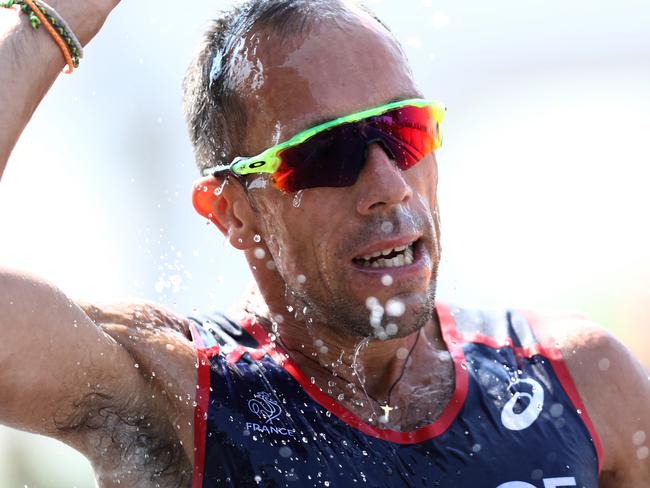 RIO DE JANEIRO, BRAZIL - AUGUST 19: Yohann Diniz of France cools off as he competes in the Men's 50km Race Walk final on Day 14 of the Rio 2016 Olympic Games at Pontal on August 19, 2016 in Rio de Janeiro, Brazil. (Photo by Bryn Lennon/Getty Images)