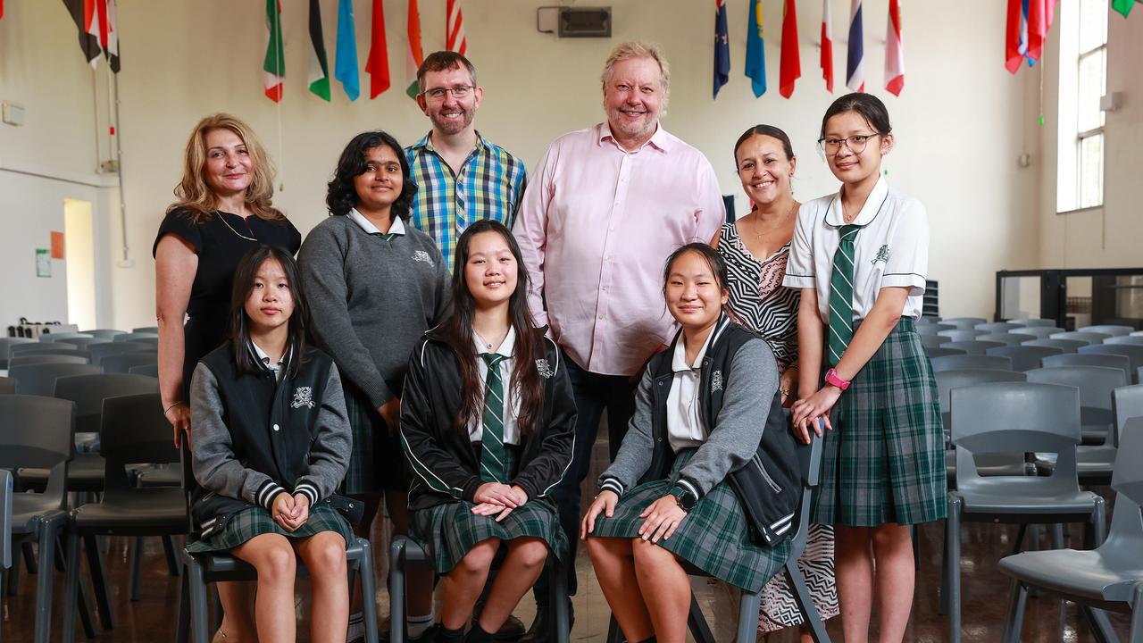 Auburn Girls High principal Anna Tsoutsa, Wendy Huang, Jahnavi Gadale, Dorothy Zhang, Grok Academy CEO James Curran, Richard White, Selina Lin, teacher Jacqueline Samuel and Htoi Tsawm Ra Maran. Picture: Justin Lloyd.