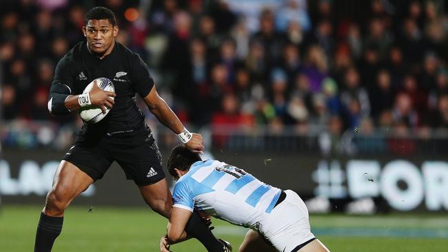 Waisake Naholo of the All Blacks makes a break against Argentina at AMI Stadium.