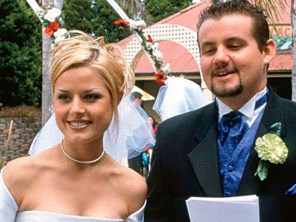 Madeleine West in a scene with her Neighbours co-star Ryan Moloney.