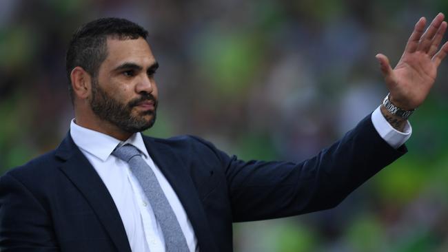 Former Rabbitohs player Greg Inglis joins the lap of honour for retiring players during the 2019 NRL Grand Final between the Canberra Raiders and the Sydney Roosters at ANZ Stadium in Sydney, Sunday, October 6, 2019. (AAP Image/Dean Lewins) NO ARCHIVING, EDITORIAL USE ONLY