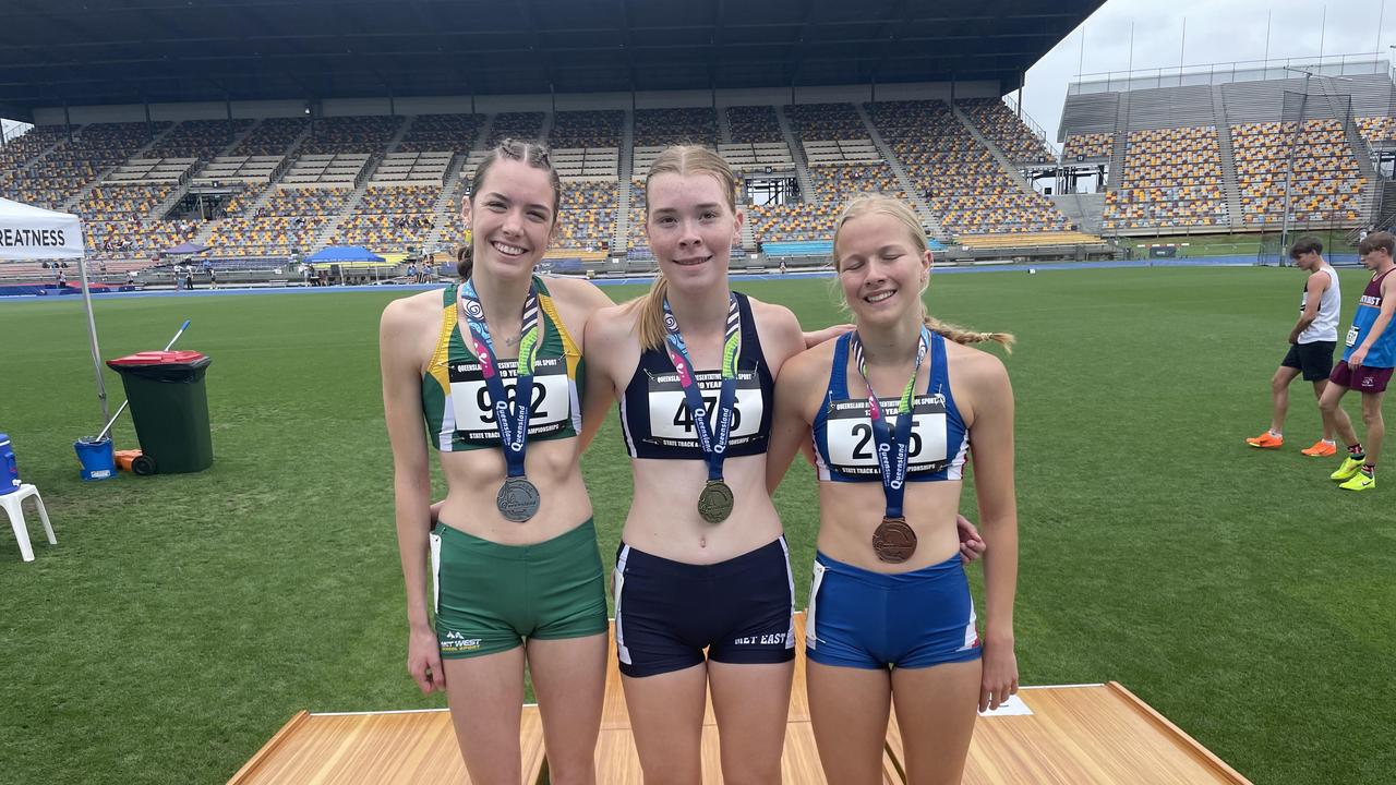 Another Moreton Bay College student, Amelia Sherrard, struck gold. Pictured middle, alongside Lola Bowen, left, and Julia Wainwright.