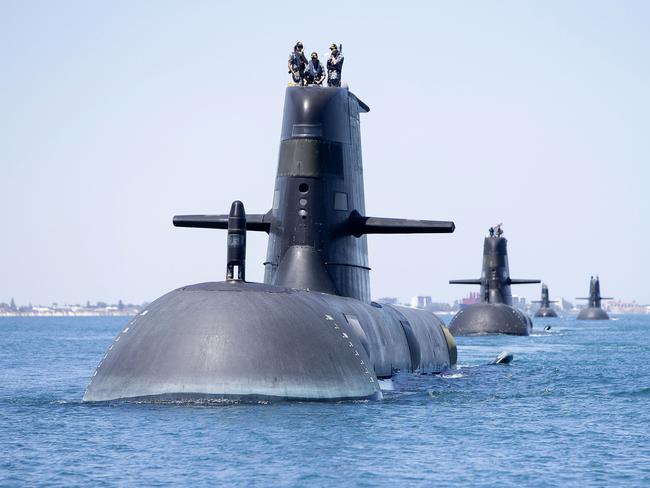 Royal Australian Navy Collins Class Submarines, HMAS Collins, HMAS Farncomb, HMAS Dechaineux and HMAS Sheean sail in formation while transiting through Cockburn Sound, WA in 2019. The HMAS Collins has docked in Brisbane for a port visit. Picture: Royal Australian Navy