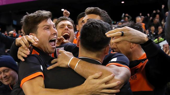 The celebrations explode in the GWS players’ race. Picture: Phil Hillyard.