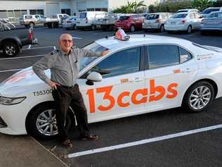 SMOOTH MOVE: Phil Shield from 13cabs with one of the new-look taxis. Picture: Mike Knott BUN080719CABS1