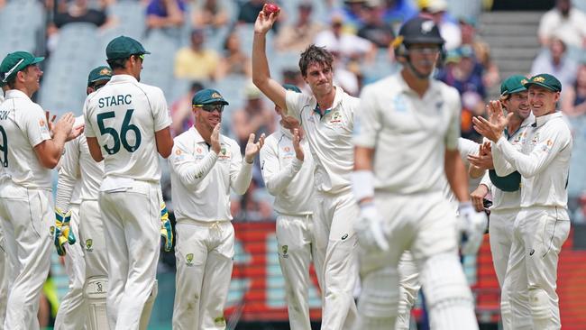 Pat Cummins celebrates taking his fifth wicket for the innings on Saturday. Australia’s bowling attack has been to hot for the Kiwis to handle. Picture: AAP