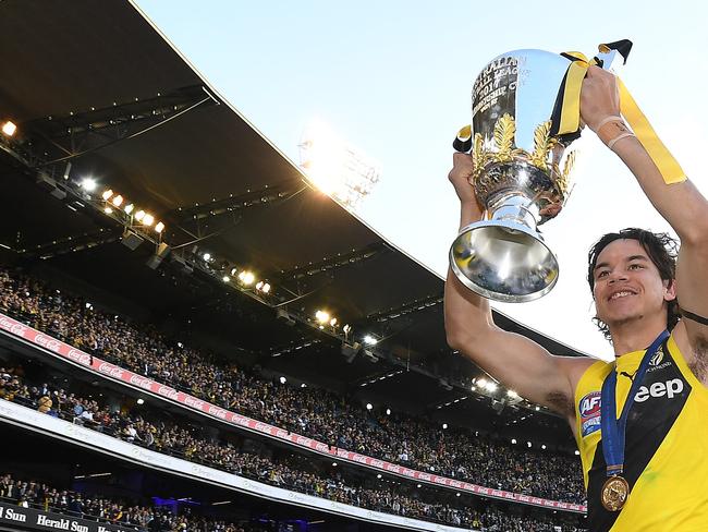 Daniel Rioli of the Tigers reacts after winning the AFL grand final between the Adelaide Crows and Richmond Tigers at the MCG in Melbourne, Saturday, September 30, 2017. (AAP Image/Julian Smith) NO ARCHIVING, EDITORIAL USE ONLY