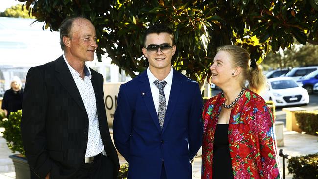 Year 12 student James Clain -17 with his Dad Jean-Francois Clain and mother Jane Clain. Picture: John Appleyard