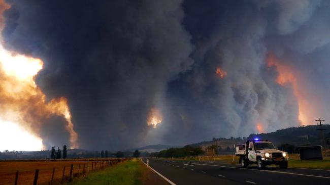 An emergency services vehicle outside of Bruthen in East Gippsland as fires approach. Picture: David Crosling