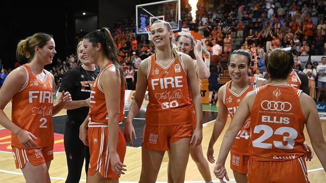 TOWNSVILLE, AUSTRALIA – FEBRUARY 26: The Fire celebrate after winning game two of the WNBL Semi Final series between Townsville Fire and Perth Lynx at Townsville Entertainment Centre, on February 26, 2025, in Townsville, Australia. (Photo by Ian Hitchcock/Getty Images)