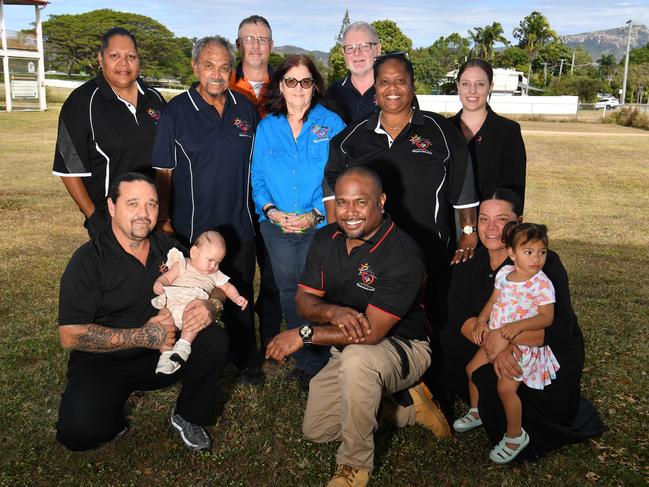 H.O.M.E (Helping Our Mob Everywhere). (front) Scott O'Brien-Burles with Inaiyah-Rose O'Brien-Burles, 4 months, Alfred Smallwood Jnr, and Ina Tukia with Niu, 2, and (back) Vicky-Anne Blackman, Alfred Smallwood Snr, Jason O'Brien, Irene Leard, Foster Johnson, Lee-Toya Sirrus and Tam Smith. Picture: Evan Morgan