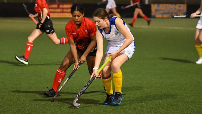 Destiny Ferguson looks to make a tackle for the Illawarra Academy of Sport. Photo: MickG Photography