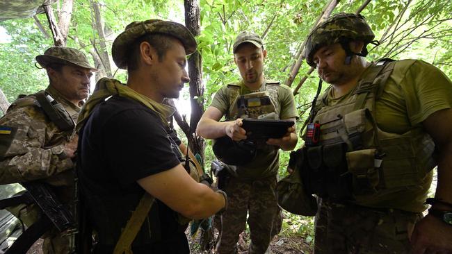 Ukrainian infantry comrades have had to learn fast, through practical experience. Picture: AFP