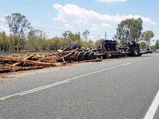 A logging truck rolled on the Capricorn Highway on Wednesday. Picture: Michael Welburn