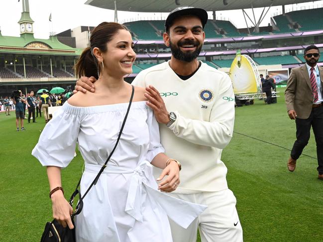 The cricketing community got used to seeing Virat Kohli accompanied by Bollywood star Anushka Sharma on tour. But that might all be coming to an end. (Photo by Peter PARKS / AFP)