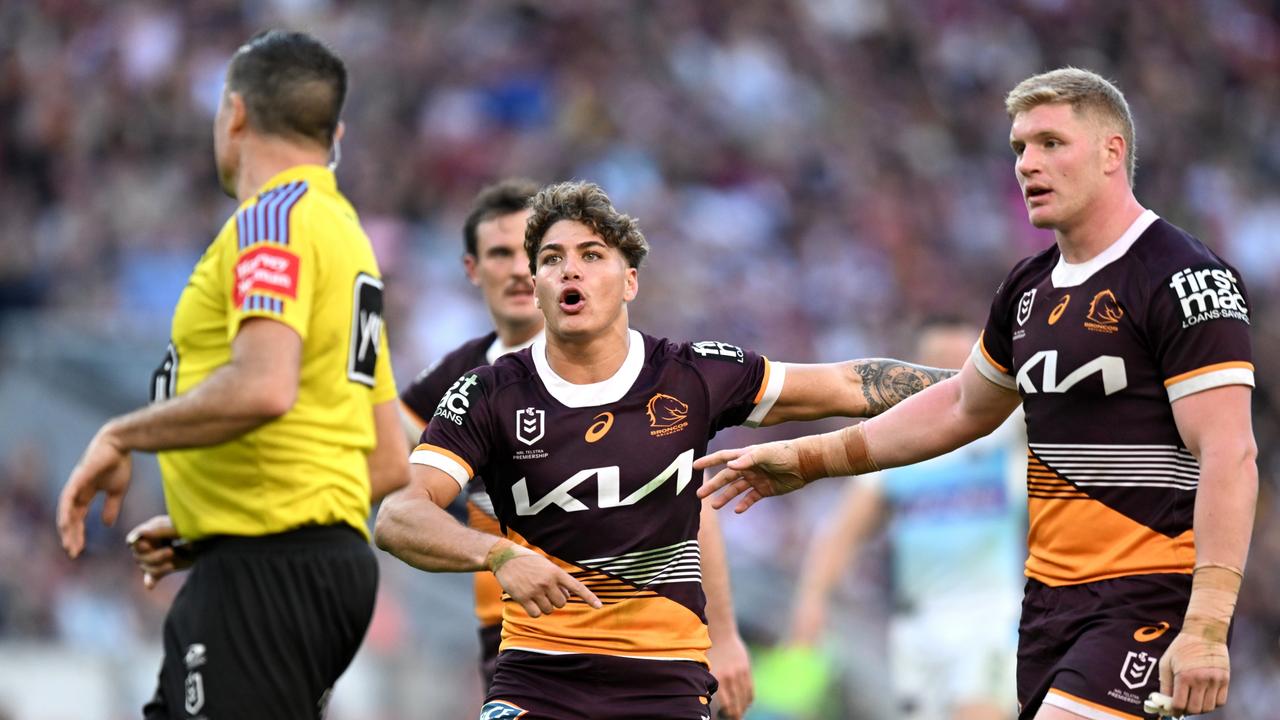 The NRL insists Chris Butler (left) has not been dropped, despite not being named to referee a game in Round 18, after his run in with Reece Walsh. Picture: NRL Images.