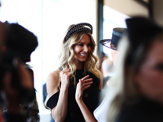 Jennifer Hawkins spotted at the Myer Marquee for Derby Day at Flemington Racecourse. She wore a black Toni Maticevski gown with a Viktoria Novak headpiece. Picture: Ryan Pierse.
