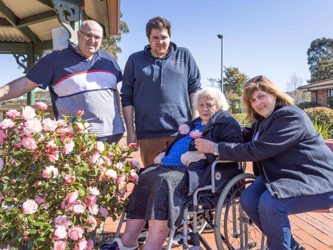 Embargoed for The Daily Telegraph.  Dina (black jacket) and Arthur (t shirt) Dracopoulos and her grand son (Kosta blue shirt) with their mother Helen at Imlay House, Pambula. Picture David Rogers