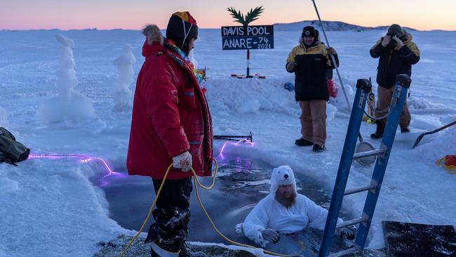 An Davis Station team in Antarctica prepares for the Winter Solstice dip. The solstice is a major celebration for Aussies stationed in Antarctica. Picture: Tiarnan Colgan / AAD