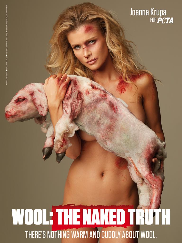 PETA campaign: US actor Joanna Krupa holds a fake lamb as part of a campaign to end mulesing.