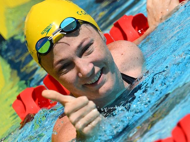 Australia's Cate Campbell gives a thumb up after the swimming women's 50m freestyle qualifications during the 2018 Gold Coast Commonwealth Games at the Optus Aquatic Centre in the Gold Coast on April 6, 2018 / AFP PHOTO / MANAN VATSYAYANA