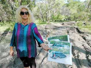 Donna Chamberlain is tired of hauling four-wheel-drive vehicles out of boggy tracks in the Kinkuna National Park. Picture: Mike Knott