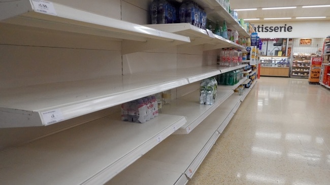 Shelves in a supermarket look sparse as supply chain issues continue. Picture: Getty Images