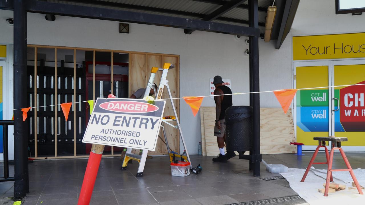 Thieves used a small back hatchback to ram raid the Bentley Park Chemist Warehouse late on Sunday night. Picture: Peter Carruthers