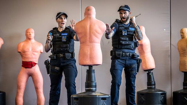 Victoria Police recruits Nina Montague, 23 and James Morrow, 28 get put through their paces. Picture: Jake Nowakowski