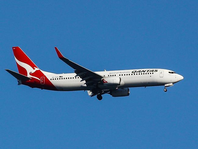 SYDNEY, AUSTRALIA - NewsWire Photos, SEPTEMBER, 12 2021: Qantas fly's over Bronte Beach in Sydney: NCA NewsWire / Gaye Gerard