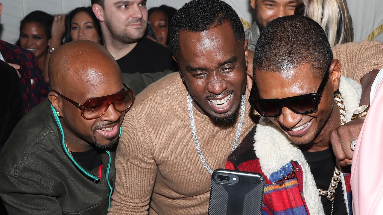 Fans have questioned if Usher’s (right) move has anything to do with longtime friend Diddy’s (centre) arrest. Picture: Jerritt Clark/Getty