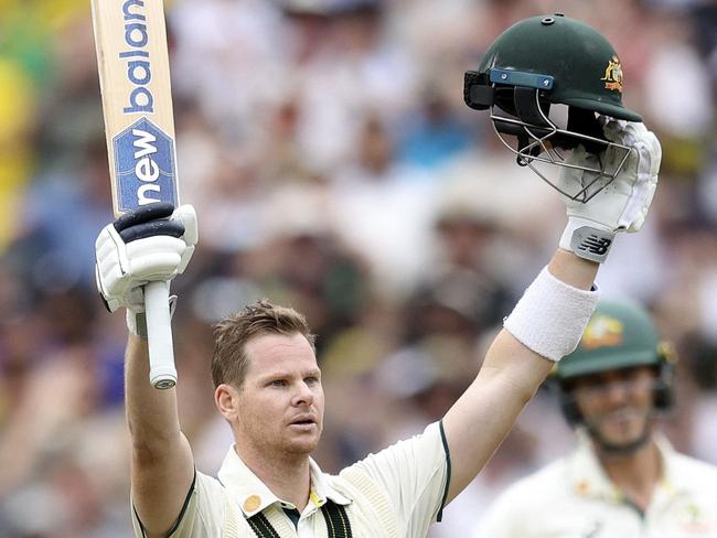 Australia's Steve Smith celebrates reaching his century (100 runs) on the second day of the fourth cricket Test match between Australia and India at the Melbourne Cricket Ground (MCG) in Melbourne on December 27, 2024. (Photo by Martin KEEP / AFP) / -- IMAGE RESTRICTED TO EDITORIAL USE - STRICTLY NO COMMERCIAL USE --