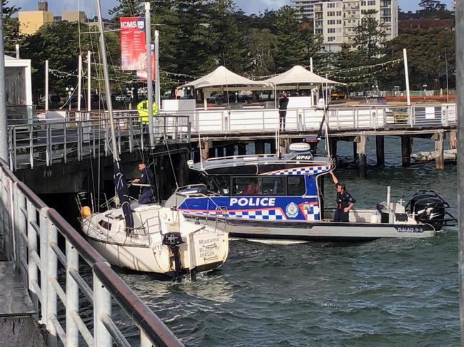 Water police towed the yacht Madama Butterfly to safety after the boat was pulled free from its mooring by strong winds. Picture: Jim O'Rourke