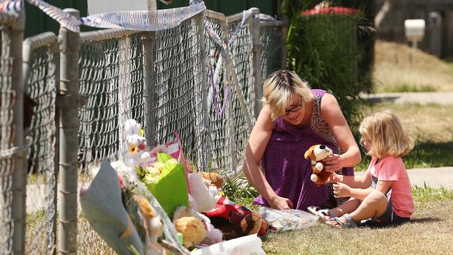 Locals leave tributes for Chloe-Ann and Darcey-Helen Conley. Picture: Lyndon Mechielsen/The Australian