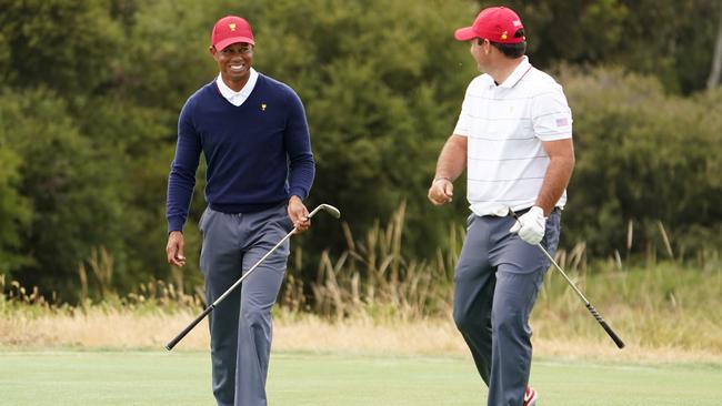 Woods has supported Reed throughout a tough week as the crowd has come down on the younger golfer hard. Picture: AAP