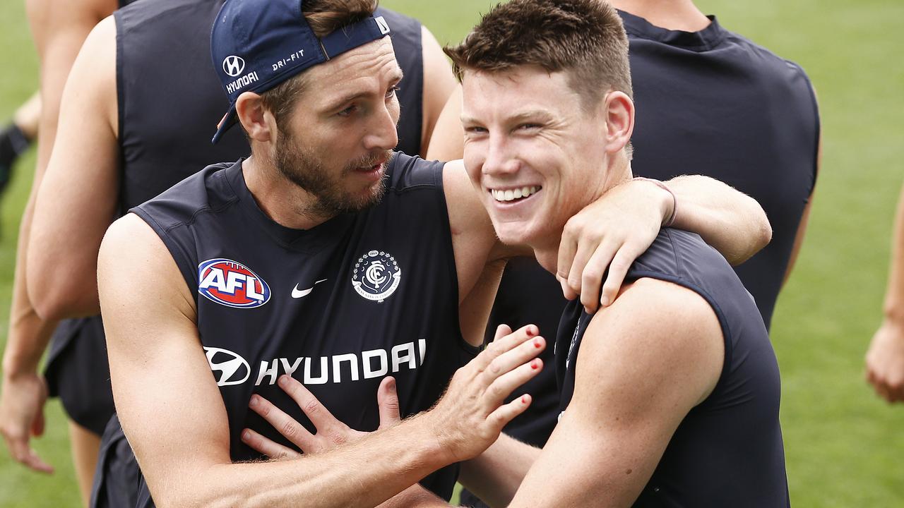 Dale Thomas congratulates Sam Walsh after news he will make his debut.