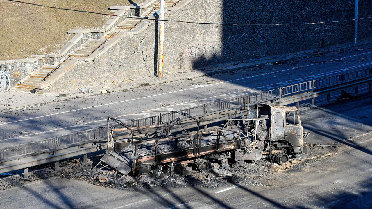 A burned-out Russian military vehicle is seen on the street. (Photo by Sergei Chuzavkov/SOPA Images/LightRocket via Getty Images)