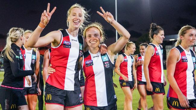 Tilly Lucas-Rodd (right) with former teammate Kate Shierlaw after a Saints win.