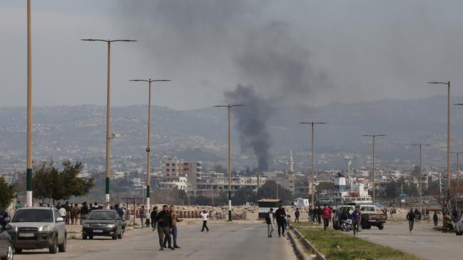 Smoke wafts after recent clashes between Assad loyalists and the new Syrian government in Baniyas, Syria. Hundreds of people have been killed in clashes between loyalists of the deposed Assad regime and forces of the country's new rulers. Picture: Ali Haj Suleiman/Getty Images