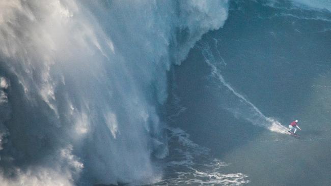 Brazilian surfer Maya Gabeira during her world record attempt in Praia do Norte, Nazaré. Pic: Bruno Aleixo.