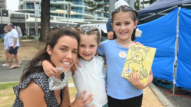 Jess, Mikayla, 4, and Evie McInnes, 6, at the Mooloolaba Foreshore Festival. Picture: Tegan Annett