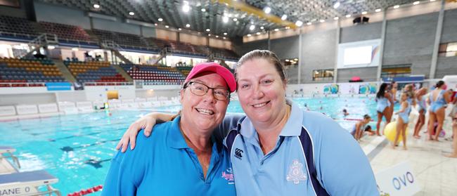 Nicola Johnson with her sisterm Kristina Sherer, after one of the grand final wins. Picture: NIGEL HALLETT