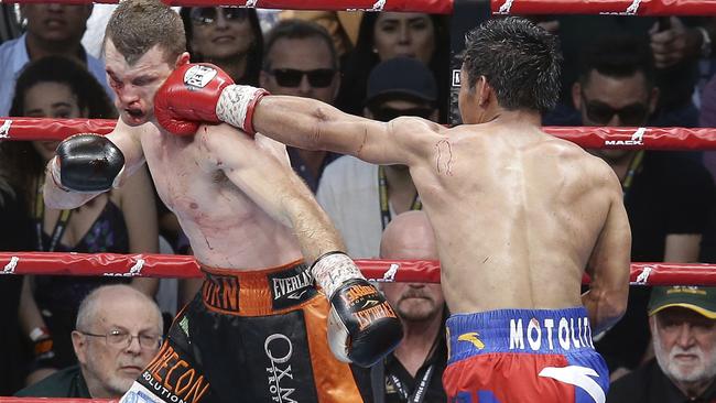 Manny Pacquiao lands a punch against Jeff Horn.