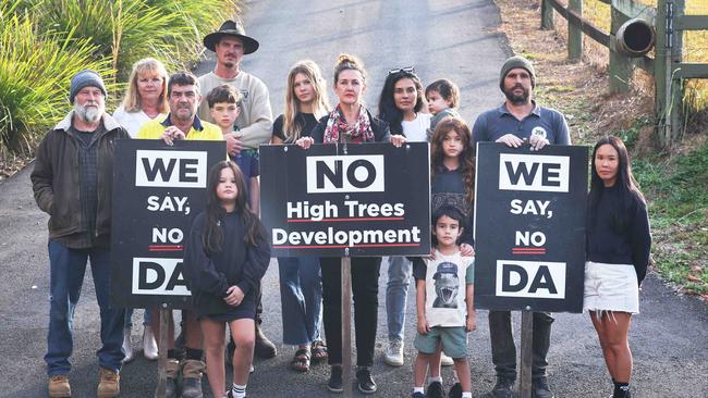 Spokeswoman Kaylee Campradt and fellow Currumbin Valley neighbours and residents stand in the driveway for a new boutique school they are opposed to in the Hinterland suburb. Picture Glenn Hampson