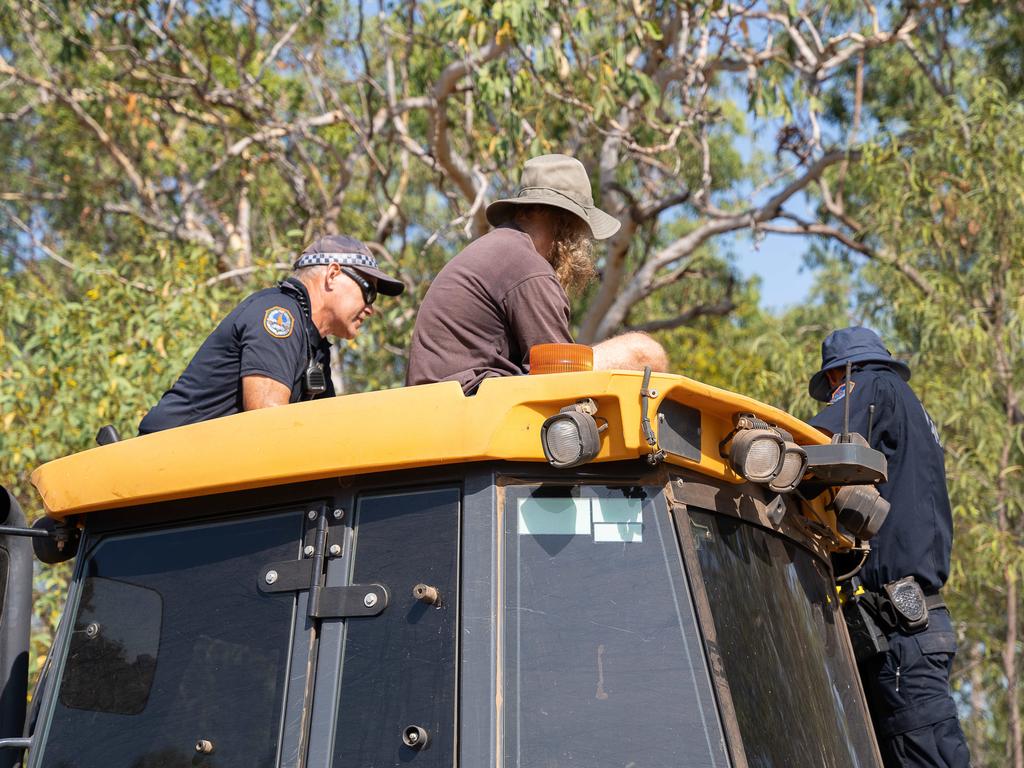 Protesters are picketing the Lee Point Defence Housing Australia Development as bulldozers move in on Stage 2 of the project. Picture: Pema Tamang Pakhrin