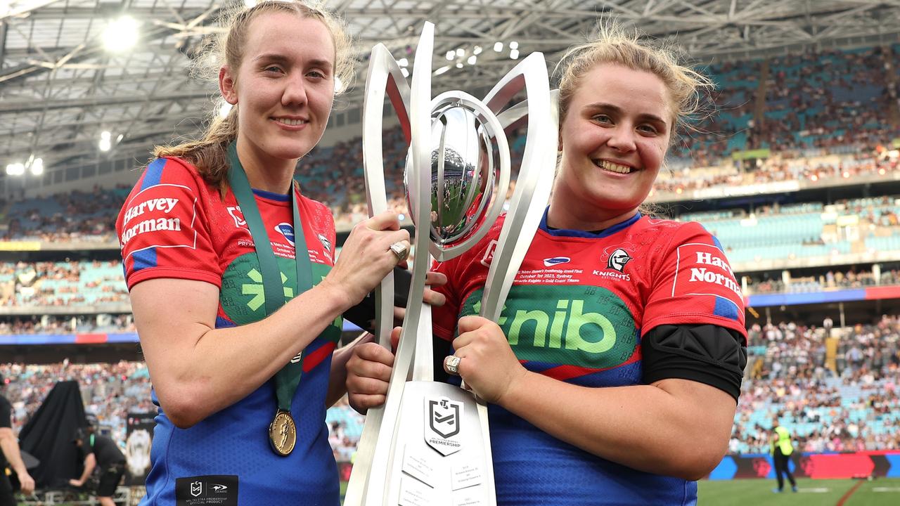 Tamika Upton and Hannah Southwell with the NRLW trophy. Photo by Matt King/Getty Images