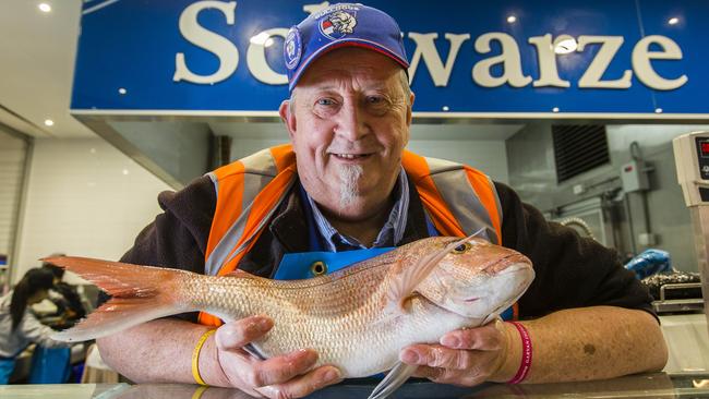 Fishmonger Dennis Schwarze’s family business has operated at the market since 1930. Picture: Valeriu Campan