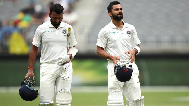 Virat Kohli and Cheteshwar Pujara. Picture: Getty Images